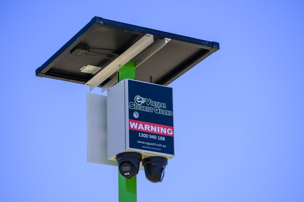 Solar-powered dual CCTV surveillance camera unit with two dome cameras